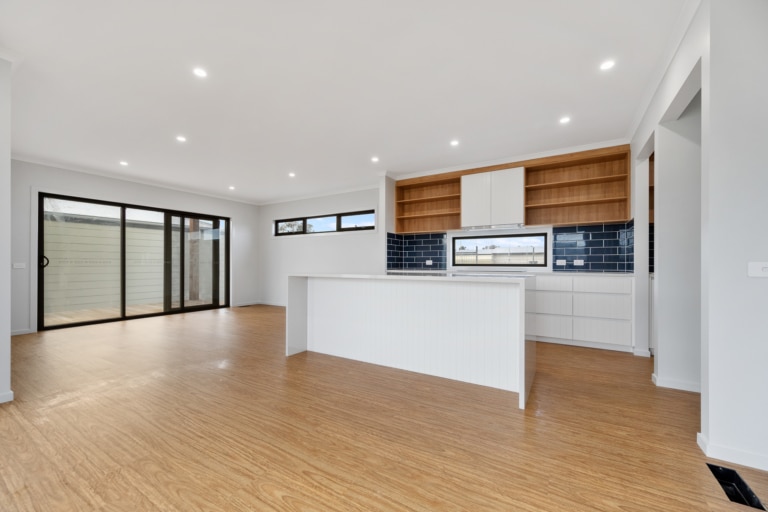 Custom exposed kitchen shelving by Capeview joinery in a Coldon Homes kitchen